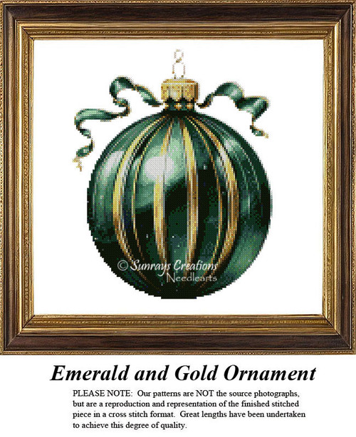 A round ornament in emerald green with gold stripes and a decorative ribbon, illustrated as a cross stitch design in a framed setting.