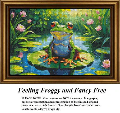 A detailed counted cross-stitch pattern preview showcasing a cheerful green tree frog sitting dead-center on a large round lily pad. The vibrant design features shimmering blue pond water reflecting the sunlight, flanked by lush green reeds and beautifully detailed pink water lilies in full bloom.