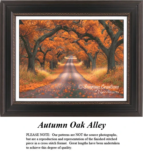 A detailed counted cross-stitch pattern preview of the autumnal landscape artwork, "Autumn Oak Alley." The warm design features a country road stretching beneath a dramatic, glowing archway of ancient oak trees dressed in vibrant, fiery orange and amber autumn leaves.