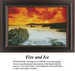 A vibrant sky in fiery oranges and yellows meets cool waters curling around dark rocks, available as a counted cross stitch pattern.