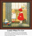 A little girl in a white dress shows her toy to another girl in a red outfit, stitched as a counted cross stitch kit, set in a cozy interior.