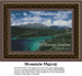 A mountain landscape with a striking backdrop, an emerald lake, and a blue sky with fluffy clouds, designed as a cross stitch design.