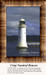 A stout lighthouse stands near a pier against blue dawn skies, reimagined as a counted cross stitch pattern.