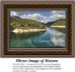 A tranquil landscape of mountains and trees surrounding a still lake, reflecting clouds and scenery, shown as a counted cross stitch design.