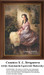 A young woman sits by a garden wall, leaning against a vine-covered pillar, frozen in time as a counted cross stitch pattern.