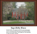 A quaint red brick house framed by flowering trees and lush shrubs, shown as a large counted cross stitch design representing the Sage Kirby House.