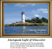 A lighthouse at Annisquam Harbor on rocky shores, shown in a downloadable pattern that uses DMC floss to create a nautical scene.