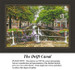 A scenic view of the Delft Canal lined with trees, featuring a parked purple bike and colorful flowers, as designed in a counted cross stitch design.