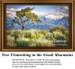 A lone tree rises in the Grecian mountains, surrounded by tall grasses in summer hues, designed as a detailed xstitch design pattern.