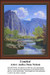 A serene landscape with tall blue mountains and a stream surrounded by boulders and greenery, designed as a printable pattern by Audley Dean Nichols.