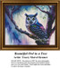 A colorful owl perched on a branch, with striking golden eyes and vibrant feathers, designed as an xstitch design by Tracey Marvel Kramer.