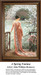 A woman stands on a veranda, gazing at blooming flowers and a peacock, brought to life as a counted cross stitch pattern.