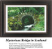 A moss-covered stone bridge arches over a fast-moving river, available as a counted cross stitch pattern for nature enthusiasts.