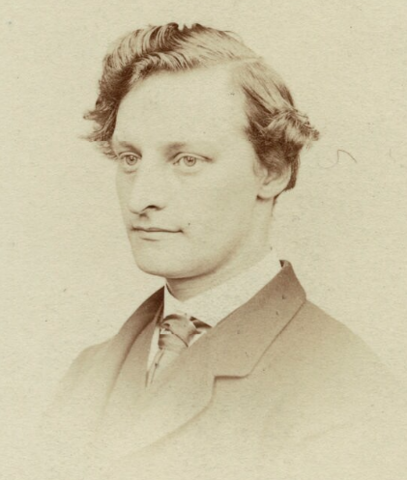 Edward Robert Hughes, Pre-Raphaelite Painter and Studio Assistant A black and white photograph of British artist Edward Robert Hughes (1851-1914), a Pre-Raphaelite painter known for his mystical, watercolor fantasy scenes and his work assisting William Holman Hunt.