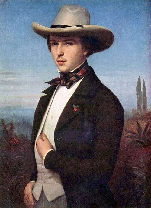 A 19th-century carte de visite photograph of artist Oswald Achenbach. He is shown in a bust-length portrait with dark, wavy hair and a full, dark mustache. He wears a formal dark jacket over a white shirt with a high collar and a dark cravat. His expression is calm and professional, typical of a mid-1800s academic professor and painter.