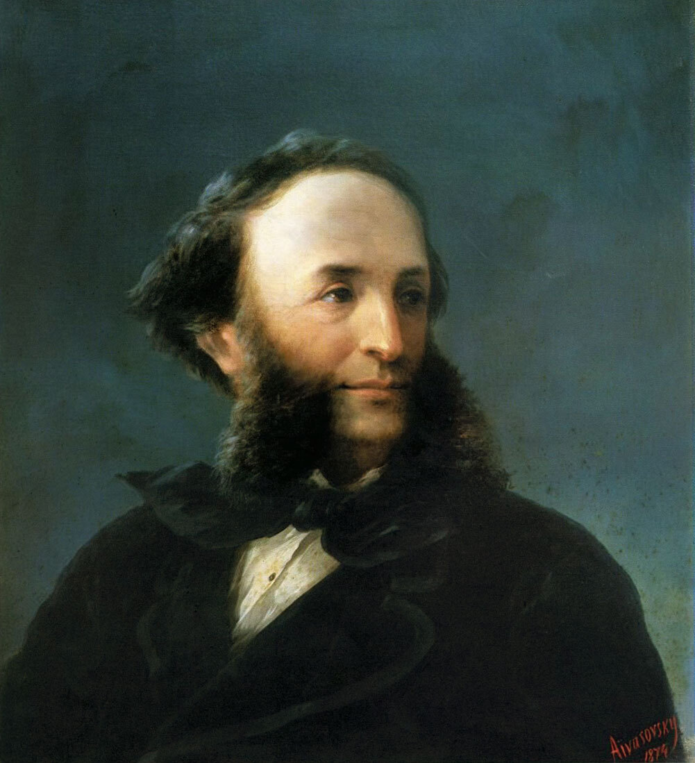 A classic 1874 oil-on-canvas self-portrait of Ivan Aivazovsky featuring the artist with a prominent beard and dark coat against a soft, atmospheric blue-grey background.