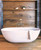 Crea 1665x780mm no-taphole freestanding solid surface bath matt white