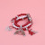 Updated DST Red and White Pearl Charm Watch Band Updated DST Red and White Pearl Charm Watch Band