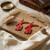 DST Fortitude Statue Red Wood Fish Hook Earrings