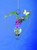 heart hanging rooting vase with Brass Butterfly accent and handblown glass vase with plants and flowers and a blue background