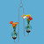 Double hanging rooting vase with Brass Butterfly accent and two handblown glass vases with flowers and blue background