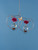 Double heart hanging vase with Brass Butterfly accent on blue background