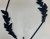 Diamond leaf hanging vase holder with matte black finish