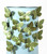 Brass butterfly magnets displayed on decorative metal container