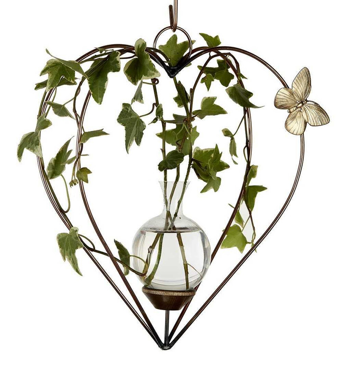 Dimensional heart hanging rooting vase with copper finish, Brass Butterfly accent, and handblown glass vase. with ivy plants