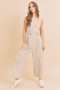 Aemi + Co Ditsy Floral Surplice Sleeveless Wide Leg Jumpsuit