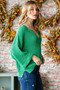 Veveret Notched Long Sleeve Sweater