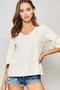 A Knit Top With Deep V Neckline And Yoke Design​