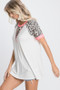 HeimishFull Size Leopard Round Neck Short Sleeve T-Shirt with Stitch Plus Size