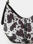 Fame Cow Print Hobo Shoulder Bag with Studded Details