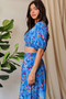 Davi & Dani Smocing Bodice Puff Short Sleeve Printed Crop Top
