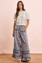 BiBi Washed Floral Denim With Ruffle Elastic Wide Pants