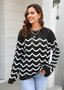 Women knitting long sleeve striped cutout sweater