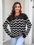 Women knitting long sleeve striped cutout sweater