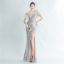 Positioning sequin feather straps off shoulder formal party evening dress