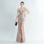 Positioning sequin feather straps off shoulder formal party evening dress