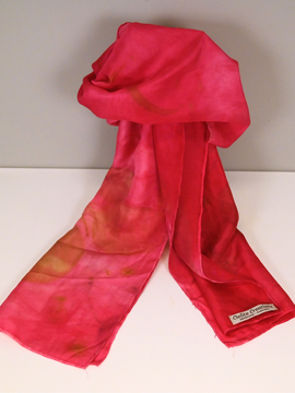 Delight in the luxurious elegance of this Mexican Pink Silk Eco Printed Scarf, a masterpiece crafted by Cielo using the innovative eco printing technique. Each scarf is meticulously made to capture the natural beauty of botanicals, resulting in unique and enchanting patterns on this bold pink scarf.