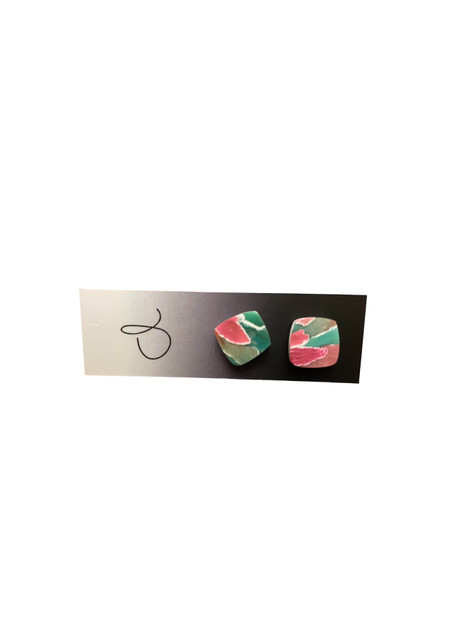 Add some sparkle to your look with these colourful polymer clay stud earrings. The almost square studs are made of white polymer clay combined in different colours. They are glued to stainless steel posts and measure about 1.2 cm in diameter. They come with ear nuts for a secure fit.