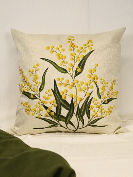 Embrace the serenity of nature with our stunning Watercolour Golden Wattle Cushion Cover, lovingly crafted by Funda, a talented watercolour artist from Turkey. Each cover is a masterpiece, showcasing Funda's exquisite hand-painted depiction of Golden Wattle, replicated onto the cusion cover.