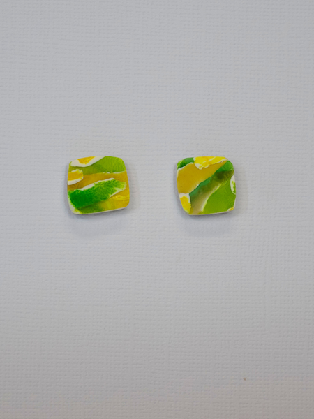 Elevate your style with Petra's fun Yellow and Green Polymer Clay stud earrings. Each pair is handmade and organically shaped, featuring vibrant colours from her Watercolour Collection.