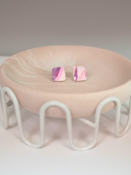 Elevate your style with Petra's pretty Light Pink and Purple Polymer Clay stud earrings. Each pair is handmade and organically shaped, featuring vibrant colours from her Watercolour Collection.