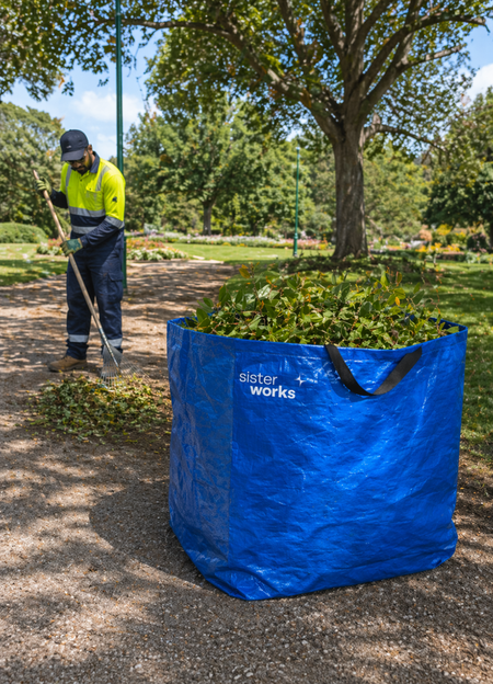 Large landscaping bag used for collecting bulk garden waste outdoors