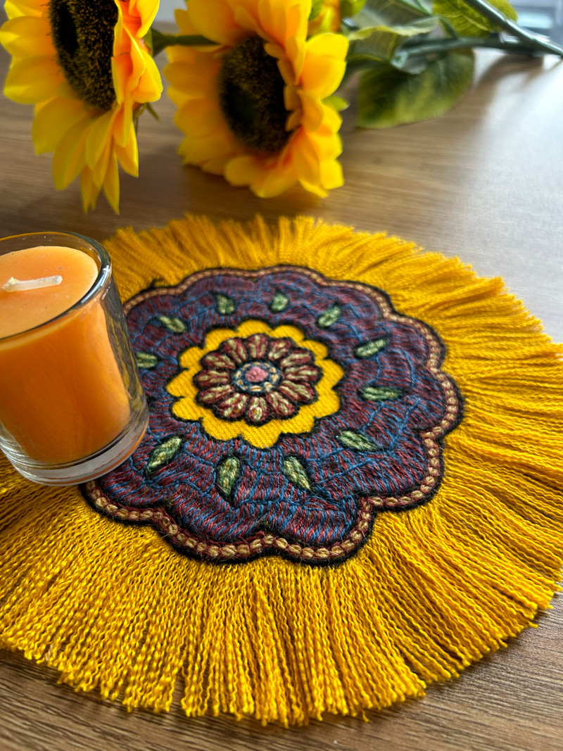 Crafted with care, this round ornament features intricate embroidery patterns in vibrant green hues. Perfect for decorating your home, office, or gifting to someone special, it’s a versatile and stylish addition to any setting.
