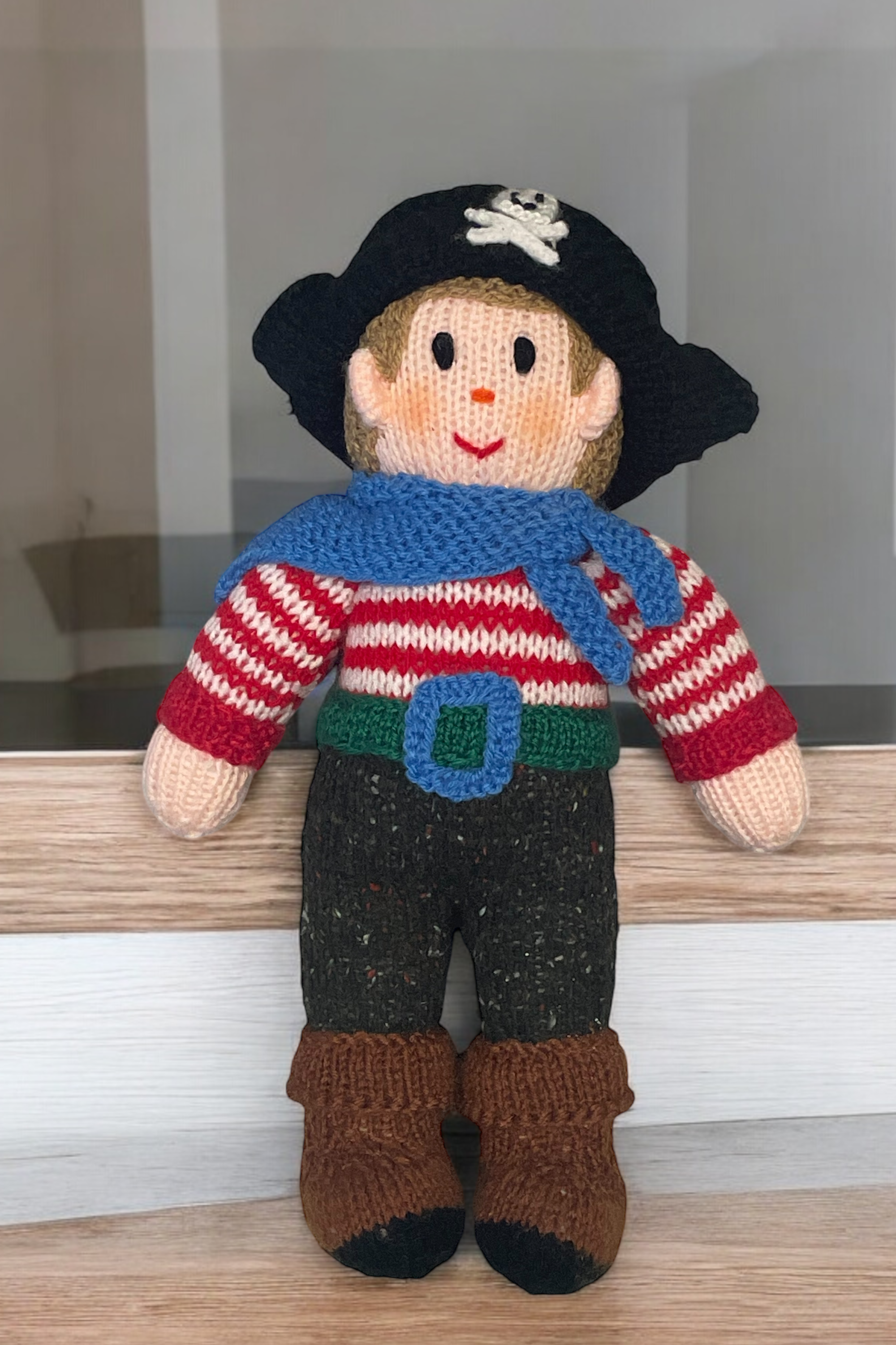If you are looking for a delightful gift for your little ones, look no further than the Knitted Pirate knitted toy.