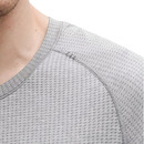 Men’s grey lululemon short sleeve performance training shirt featuring a lightweight textured upper panel, athletic fit, and breathable moisture wicking fabric designed for workouts and everyday wear.