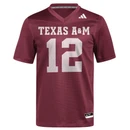 Maroon adidas Texas A&M football jersey featuring TEXAS A&M across the chest with white number 12 on the front, mesh body design, V neck collar, and adidas logo on the upper chest, Texas A&M Aggies replica 12th Man jersey designed for gameday and stadium spirit wear.